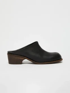 Backless leather mules