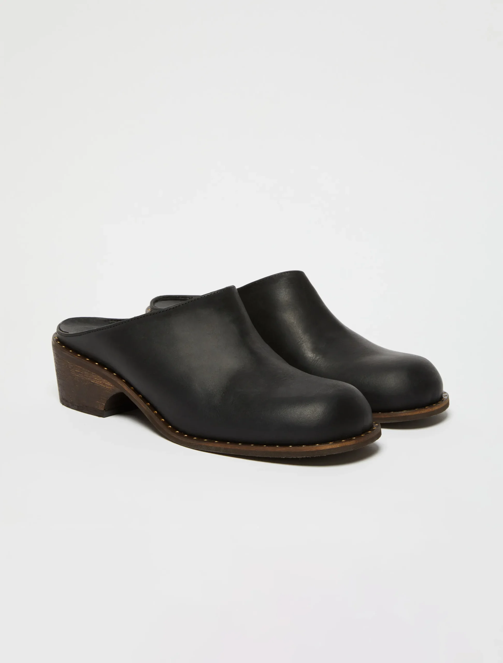 Backless leather mules