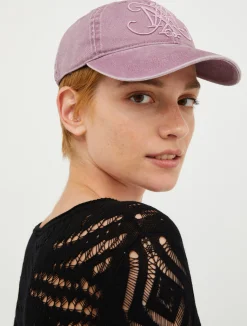 Baseball cap with monogram.