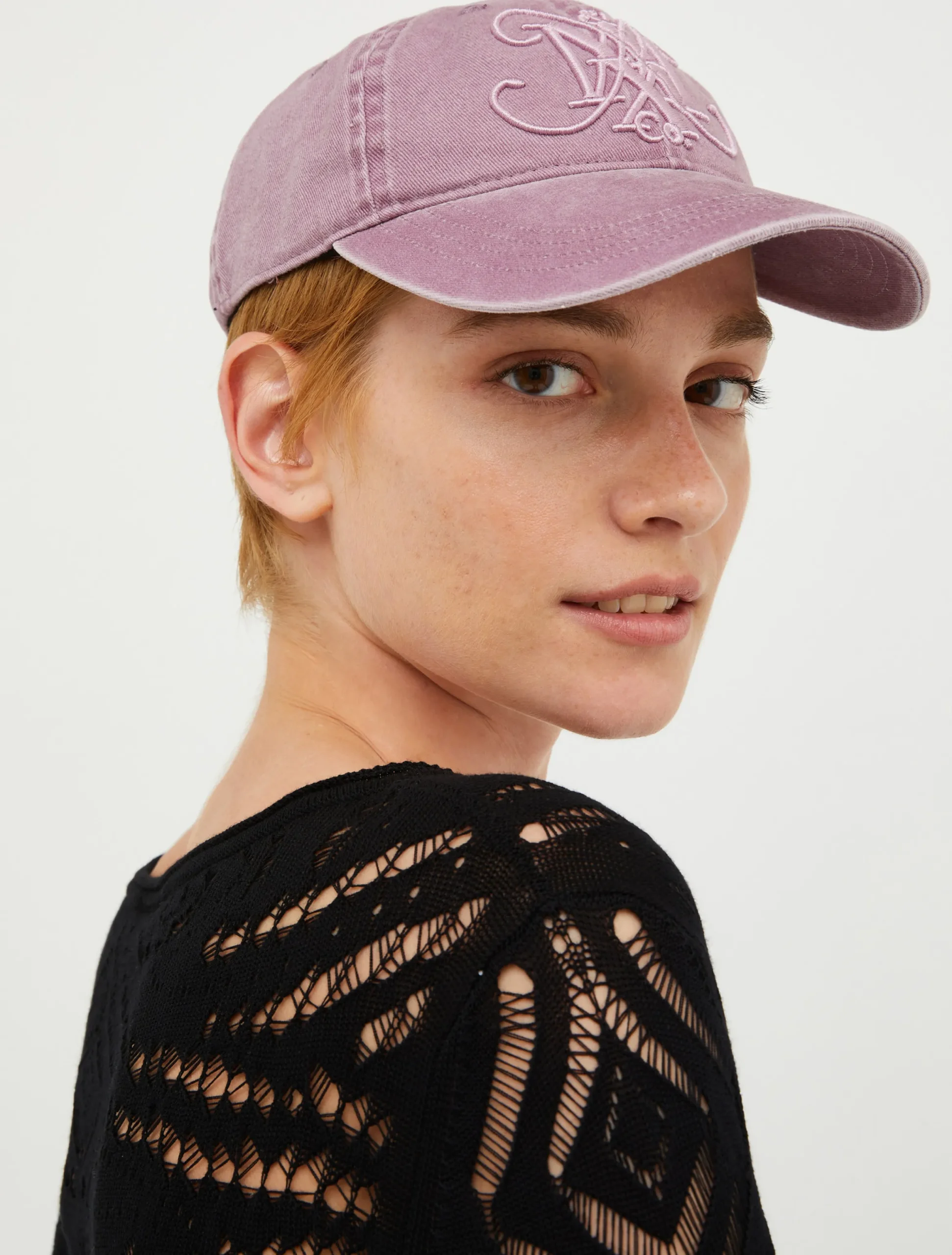 Baseball cap with monogram.