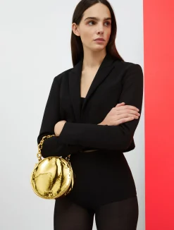 De-Coated with Anna Dello Russo metallic dot bag