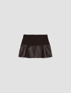 Jersey and leather mini skirt