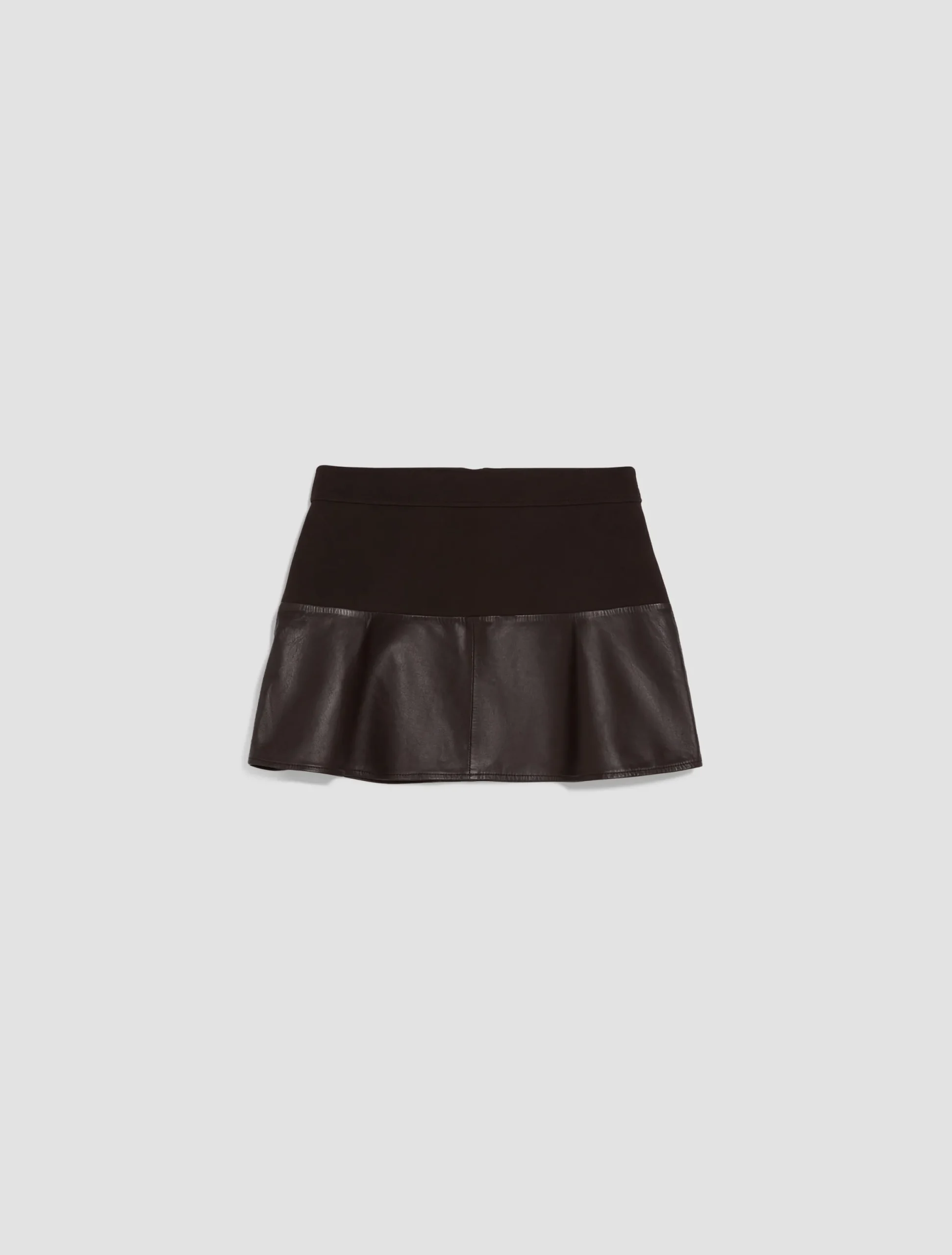 Jersey and leather mini skirt