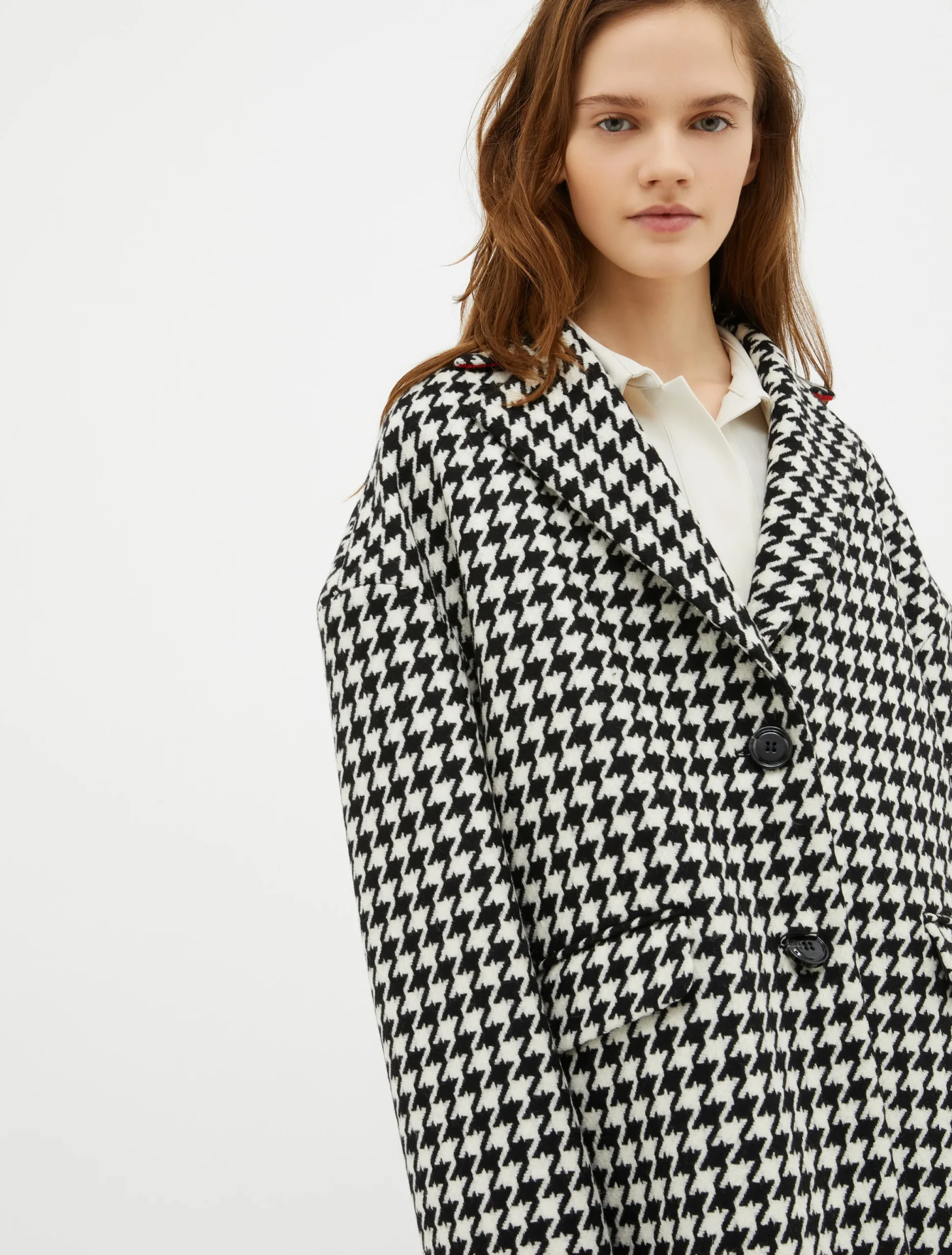 Oversized houndstooth coat